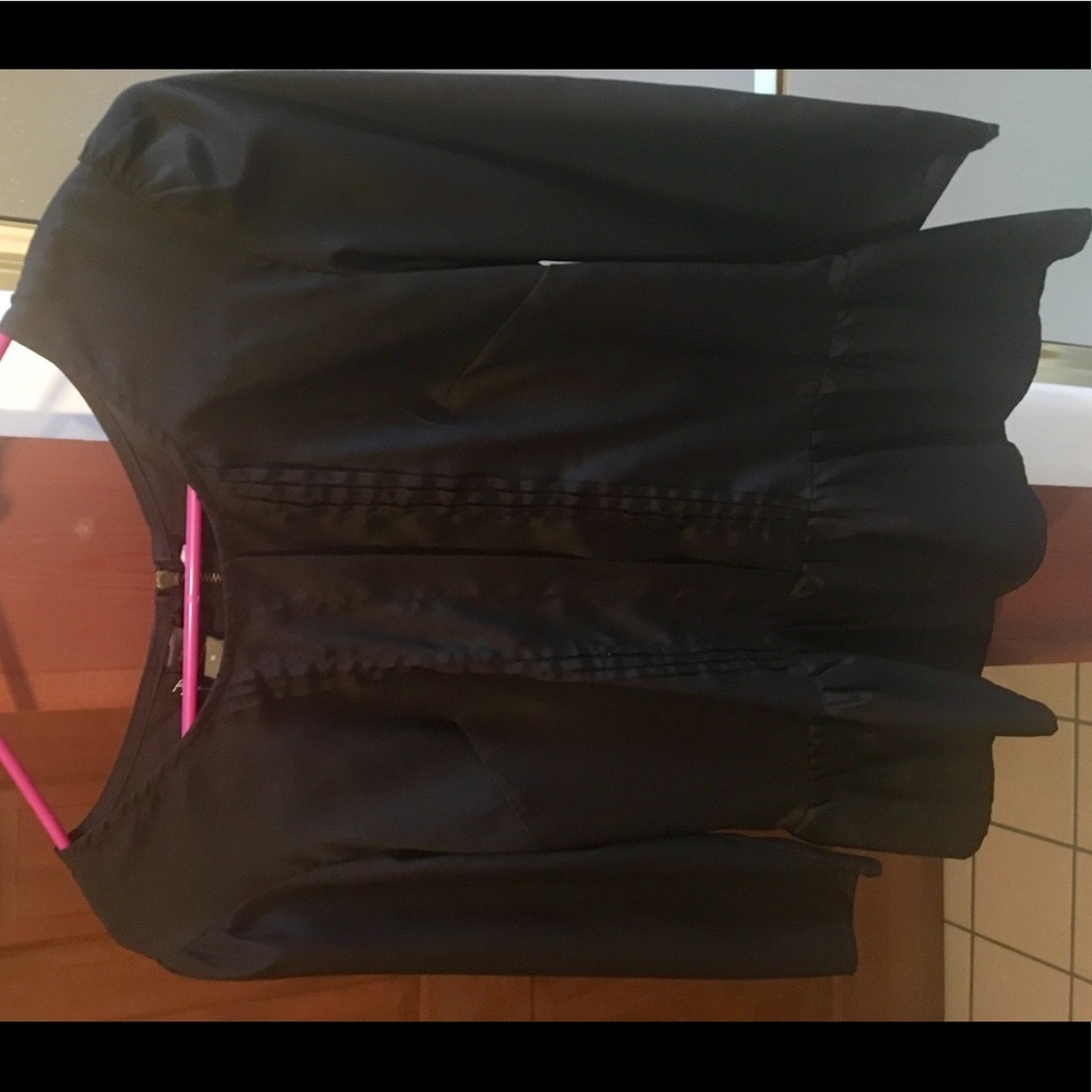 Black peplum blouse with zipper down the back